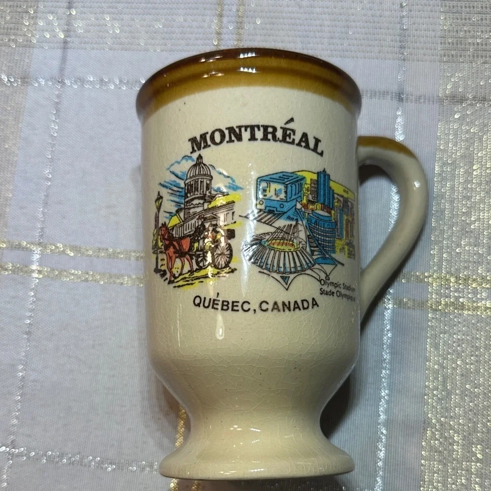 Vintage ceramic souvenir coffee mug with illustration of Montreal Quebec OS